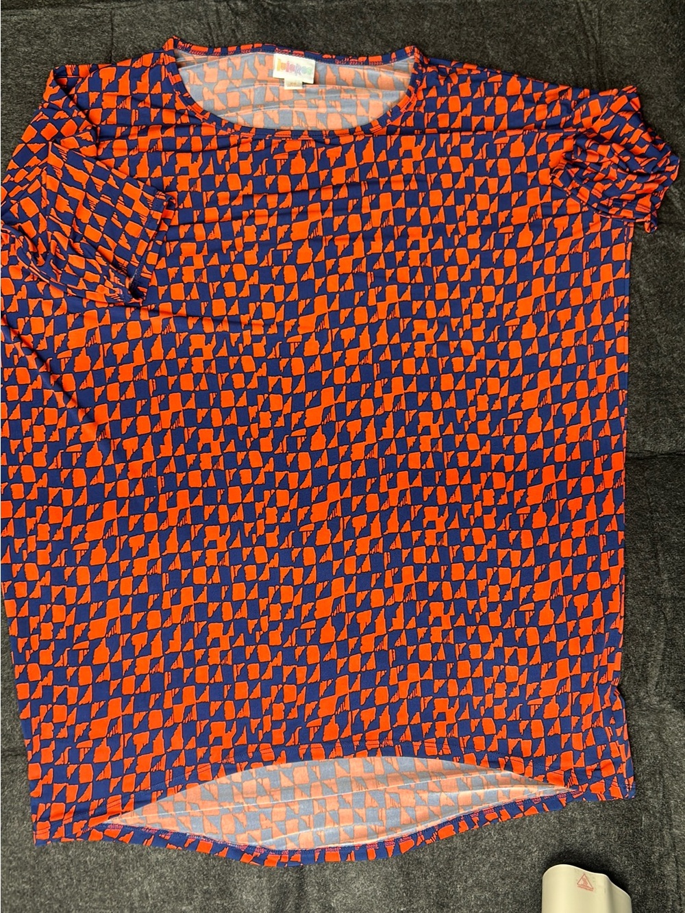 LuLaRoe Short-Sleeve Top in Orange & Blue Geometric Print
